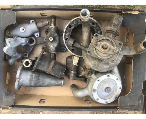A box of vintage Bentley castings to include water pumps, a nose cone etc. 