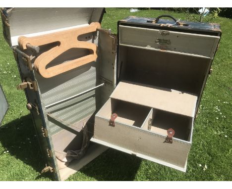 A Selfridges Vertex travelling wardrobe trunk.
