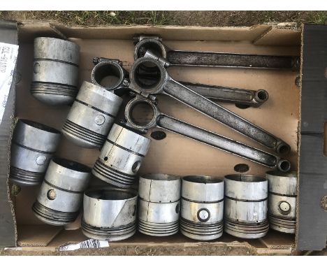 Four conrods and a quantity of pistons, probably vintage Bentley.