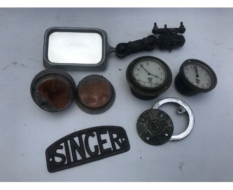An autojumbler's lot including vintage Smiths clocks, a mirror, light etc. 