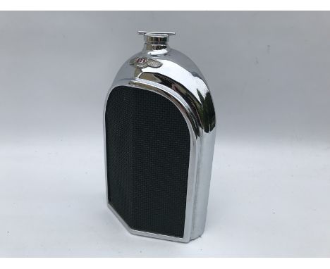 A Ruddspeed Limited decanter in the form of a vintage Bentley radiator.