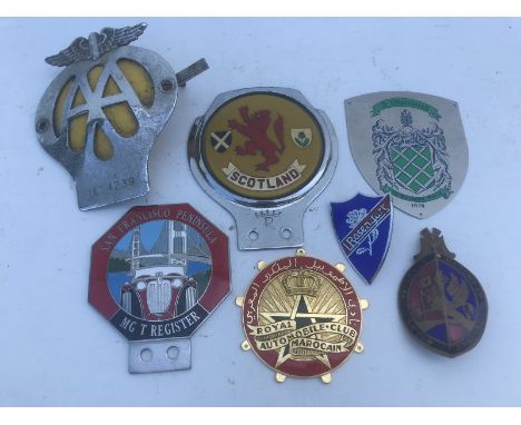 A selection of assorted badges to include a shield shaped part enamel Rosengart badge, Vauxhall Motors etc.
