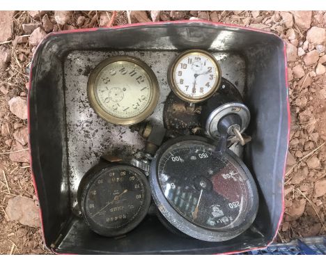 A tin of assorted vintage instruments. 