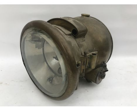 An Alpha BRC no. 30 Brevete brass acetylene self-generating headlamp.