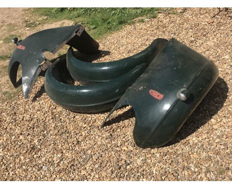A set of four pre-war wings by repute from a vintage Bentley.