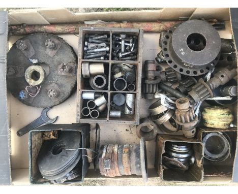 A box of mostly vintage Bentley parts to include a fabric coupling cover, starter motor dogs etc.