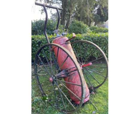 Salvage - An unusual country house large fire cart, foam engine, large riveted cylinder, two huge spoken wheels, 230cm long, 