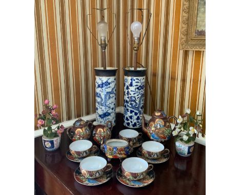A pair of Chinese crackle glaze sleeve vases, decorated in underglaze blue with scrolling dragons, 36cm high, 20th century (f