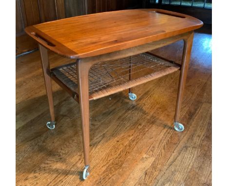 A post war Danish teak trolley table,  designed by Johannes Sandersen for Silkeborg, lift off tray,  raffia shelf, on casters