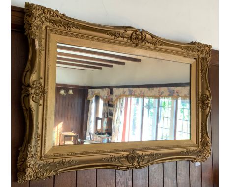 A gilt rectangular mirror, 63cm x 103cm** We would please ask that all payments are made by 12pm on Thursday 14th April at th