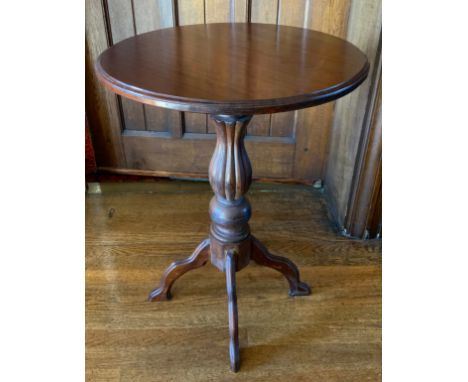 A 19th century mahogany occasional table, circular top, lobed baluster columns, four shaped legs, 68cm high** We would please
