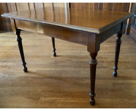 An early 20th century mahogany rectangular side/serving  table, fluted legs, 76cm high, 123cm wide, 74cm deep** We would plea