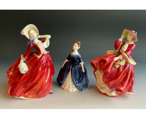 A Royal Doulton figure, Top O' the Hill, HN1234;  others, Autumn Breezes, HN1939;  Debbie, HN2385 (3)** We would please ask t