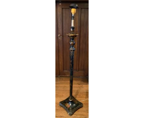 An early 20th century chinoiserie standard lamp, decorated in with fanciful birds and foliage, in gilt and red on a black gro