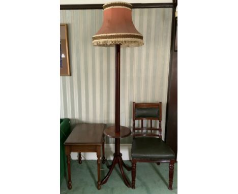 A mahogany standard lamp, with shelf, four sabre legs;  a mahogany side table;  a Victorian mahogany dining chair  (3)** We w