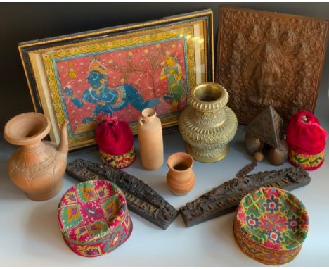 A Balinese brass vase;  two carved wooden name panels;  needlework smokers hats;  clay pots;  etc** We would please ask that 