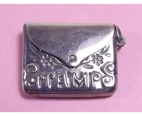 A small silver stamp holder marked 925