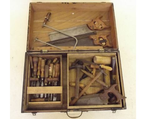 A carpenter's tool box and contents of tools including chisels, saws etc