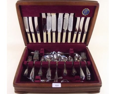 A vintage stainless steel cutlery set - boxed