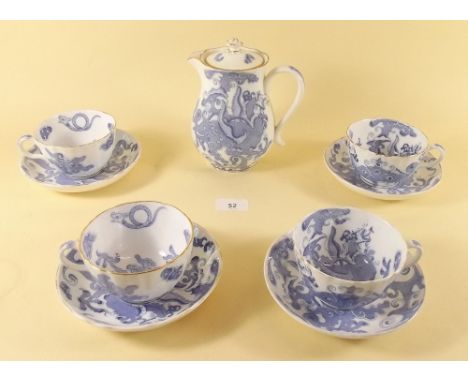 A Royal Worcester Blue Dragon set of four tea cups and saucers and a hot water jug