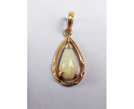 A 14k gold opal pendant