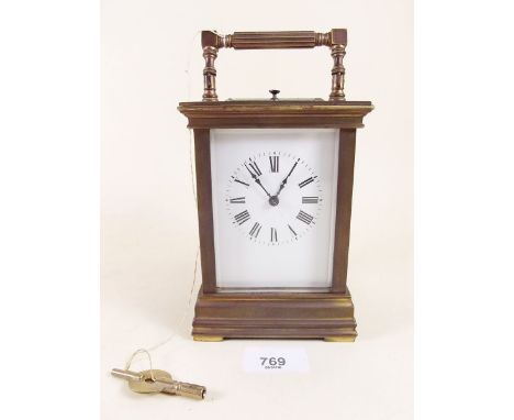A 19th century brass carriage clock with striking movement and repeater