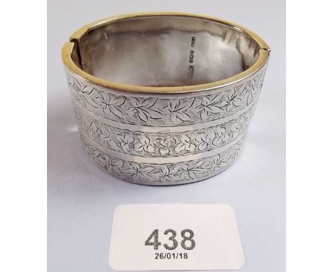 A wide Kenart silver tripled banded bangle