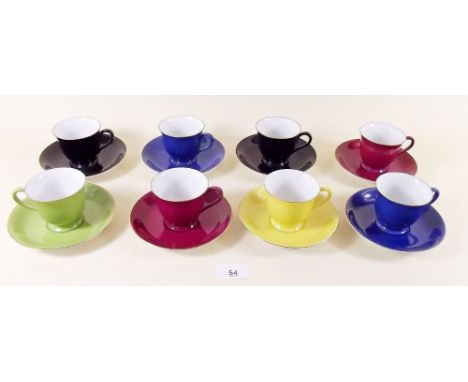 A Noritake harlequin coffee set comprising eight cups and saucers