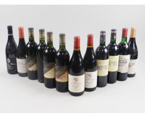 A mixed lot to include Chateau Latour Martillac Grand Cru Classe Graves 1980 (4), Cote du Rhones Village 2005 and Cote du Rho