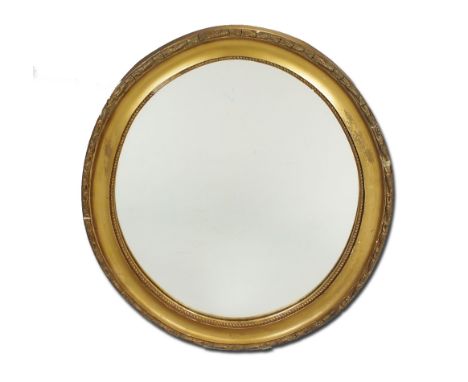 An oval gilt gesso wall mirror, 60cm wide and a Spanish gilt framed wall mirror with reeded frame and foliate open bracket su