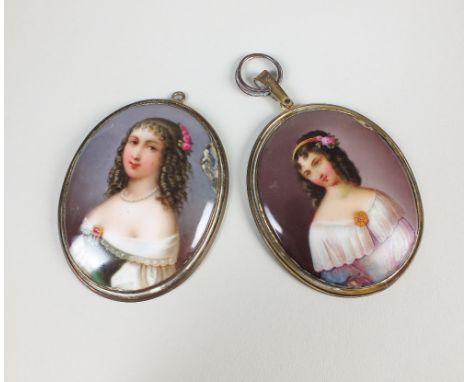 Two oval ceramic plaque pendants, each depicting the portrait of a young lady