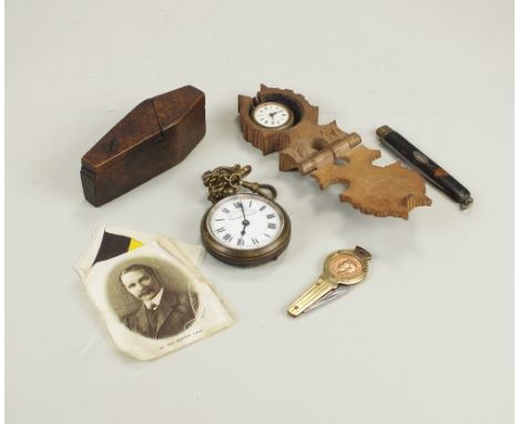 A base metal pocket watch with white enamel dial marked 'Railway Time Keeper, Specially Examined' and short chain, a treen co