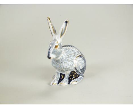 A Royal Crown Derby paperweight of a Star Light Hare, a limited edition with gold stopper, 14cm high; complete with original 