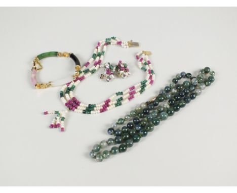 A gilt mounted Chinese jade bracelet, together with a pair of cultured pearl earrings, a moss agate bead necklace, a freshwat