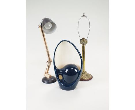 An Edwardian brass table lamp on circular petal leaf cast base, an Art pottery ceramic table lamp and an adjustable table spo