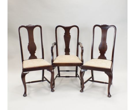 A set of five (4+1) Queen Anne style mahogany dining chairs each with vase shaped splat back and drop in seat and raised on c