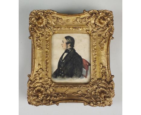 British school, mid 19th century, Portrait of a young man, half length seated wearing a black stock and jacket, watercolour, 