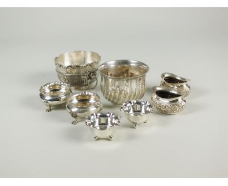 A pair of circular silver salts, M & J, Chester 1904, together with two further pairs of silver salts, a silver bon bon dish 