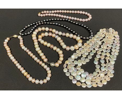 A selection of Pearl Jewellery;to include; a single strand "375" stamped gold clasp multi tonal pink pearl necklace, a single