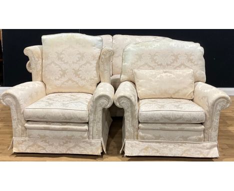 A contemporary three-piece sitting room suite, composing sofa, wing chair and armchair, the sofa 85.5cm high, 191cm wide, the