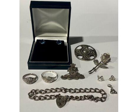 A selection of Silver and Unmarked White Metal Jewelleryto include; a vintage scottish silver John Hart Iona celtic brooch, a