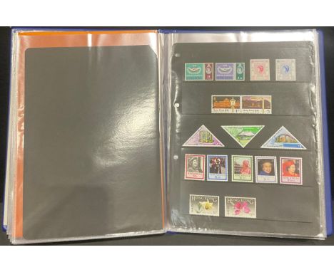 Stamps - an album of Hong Kong stamps, presentation packs, first day covers, etc