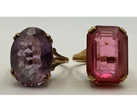 A vibrant pale purple oval amethyst dress ring, 9ct gold shank, size L, 5.9g gross, another pink stone, 9ct gold (tested) sha