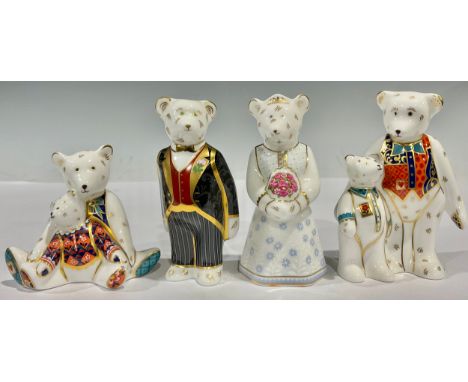 A Royal Crown Derby miniature bear model, Daddy and George, first quality; others Mummy and Charlotte, second quality; a simi