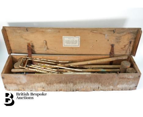 A vintage garden croquet and and lawn bowls set, both sets contained in their own large pine box.&nbsp;