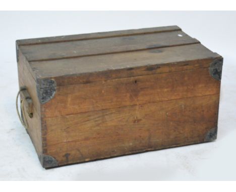 A large c.1900 trunk with single rope handle to one side.