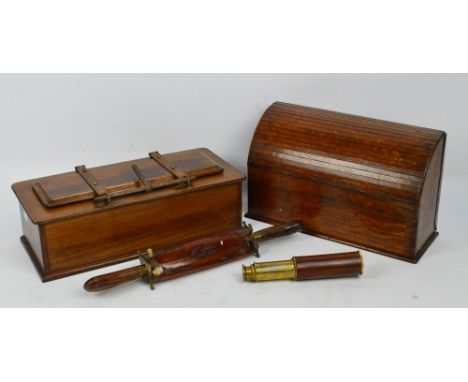 An early 20th century oak trinket box with tie press to the lid, an oak stationery rack with pull-down tambour front, a repro