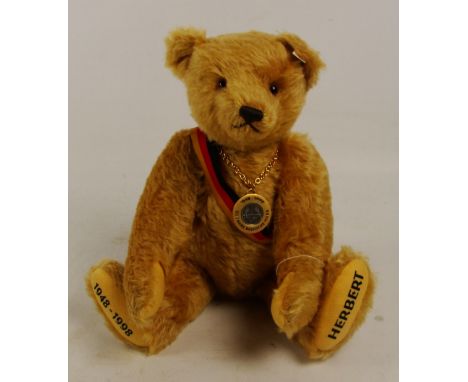 A boxed Steiff 1998 Herbert teddy bear, no. 655395, with numbered white and red tag to ear, with golden brown mohair fur, wit