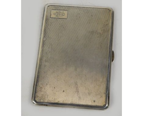 A George VI hallmarked silver rectangular cigarette case with canted corners, engine turned decoration and monogrammed rectan