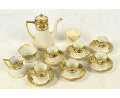 A Noritake floral decorated gilt heightened part coffee set, comprising coffee pot, six cups, six saucers, jug and bowl, also